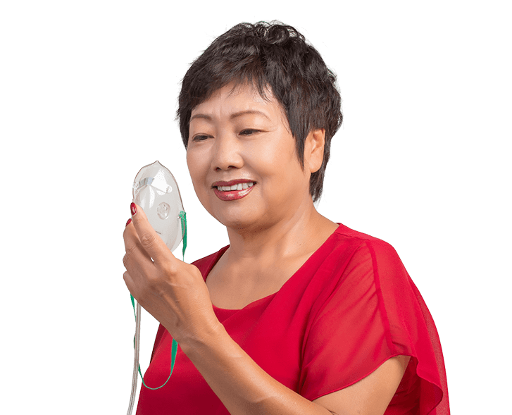 Senior woman using an oxygen mask