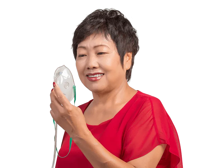 Senior woman using an oxygen mask