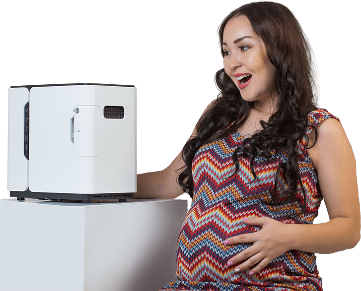 Pregnant woman with a Restore oxygen concentrator