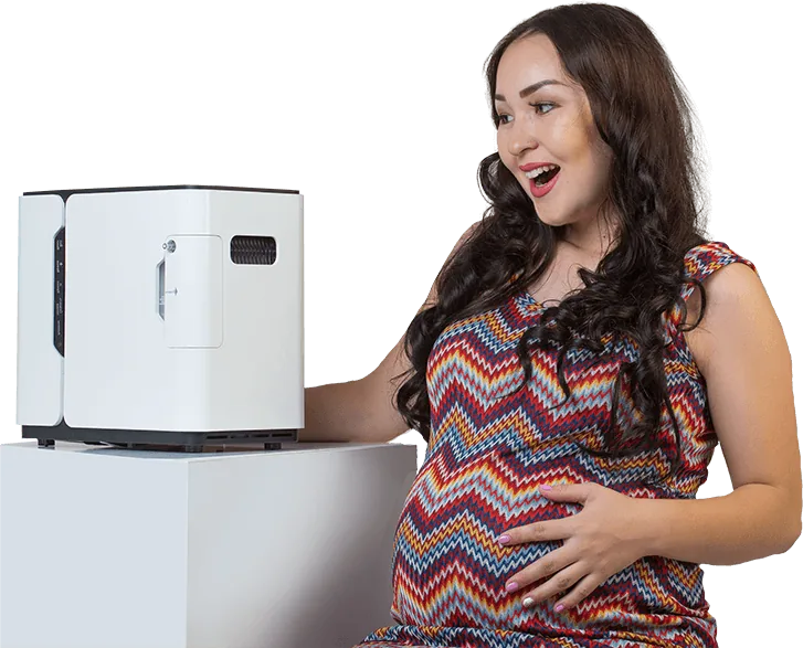 Pregnant woman with a Restore oxygen concentrator